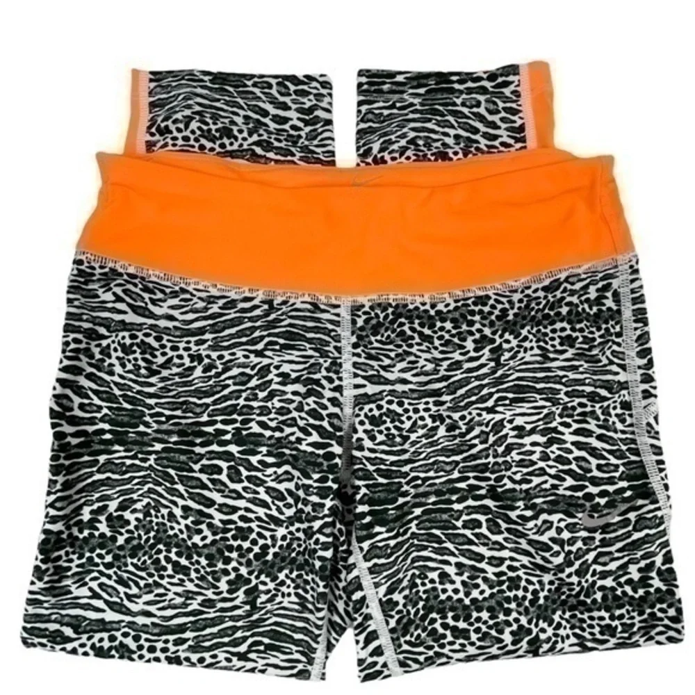 Nike Dri-Fit Women Cropped Leggings Medium | Black White Orange